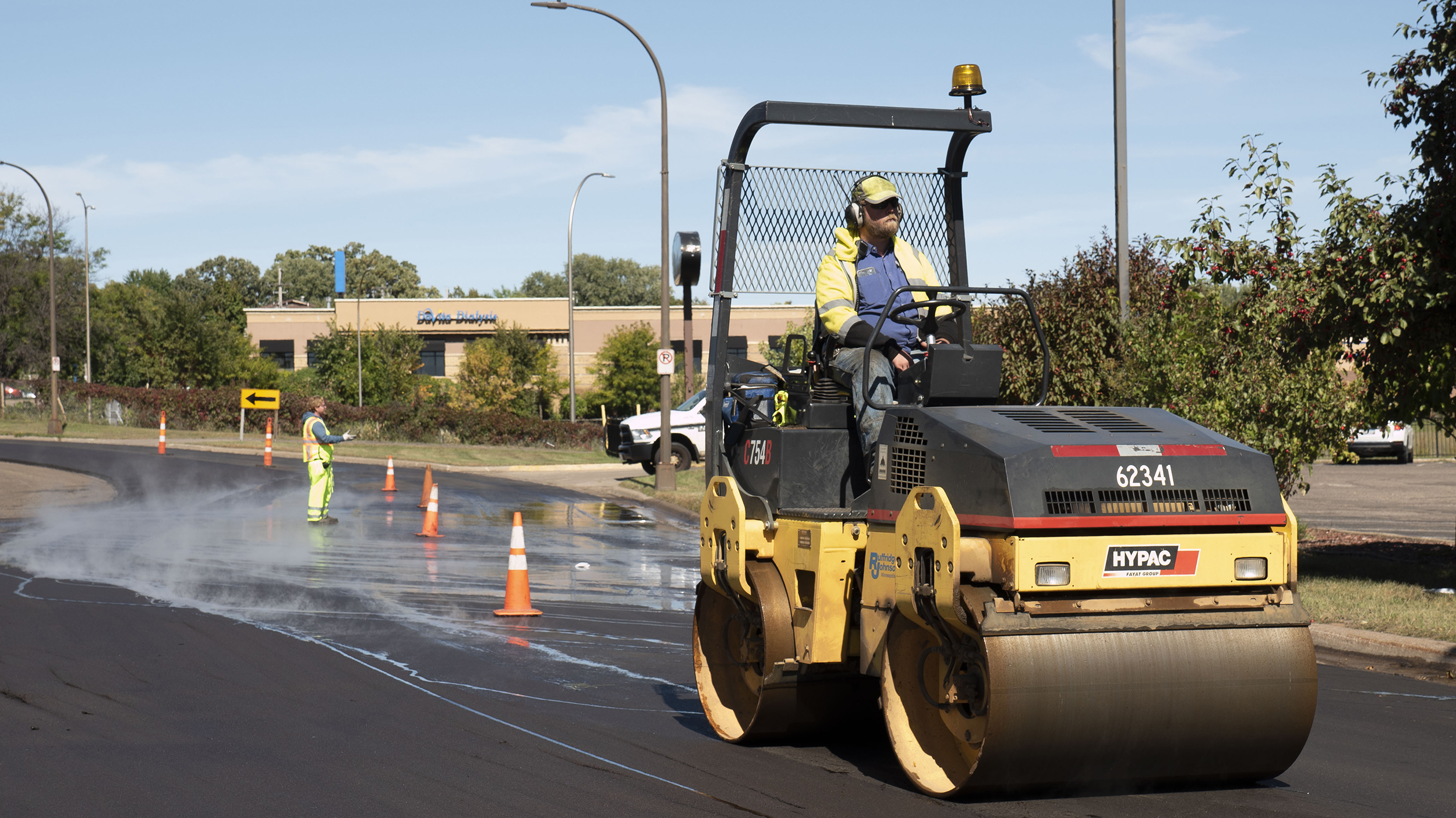 Mill and overlay work proceeds on a Saint Paul street