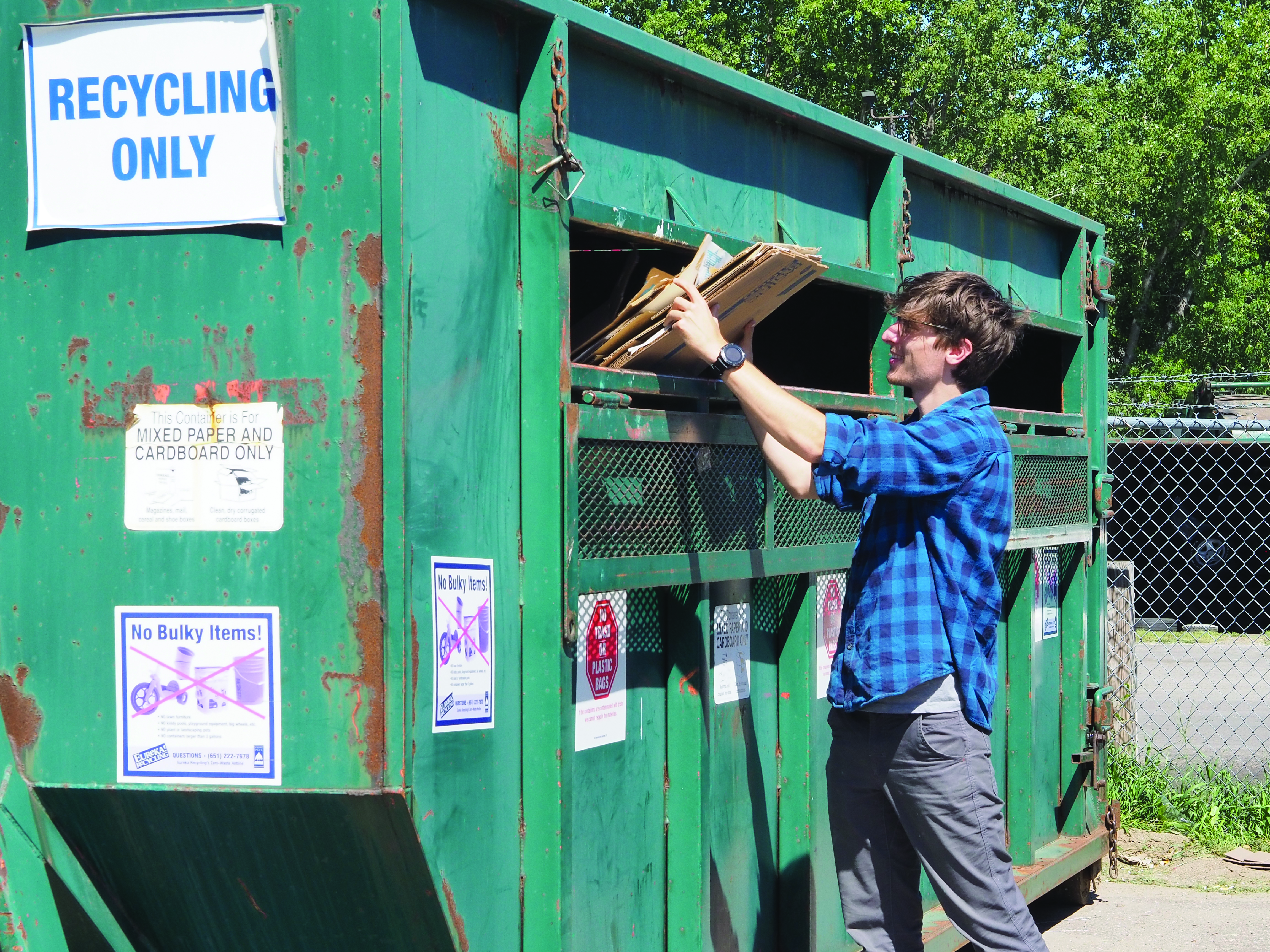 Man dropping off recycling