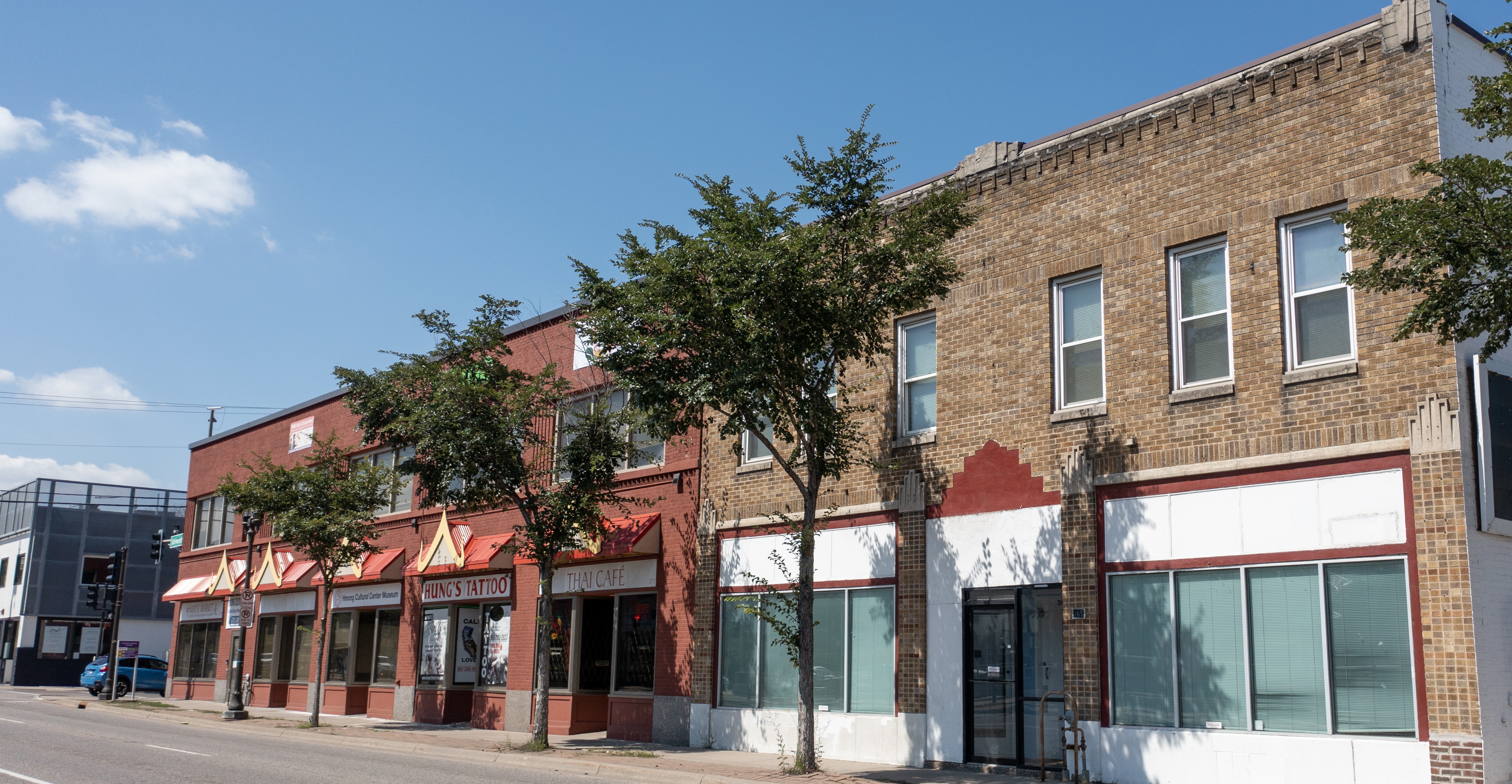 a photo taken of store fronts on Grand avenue