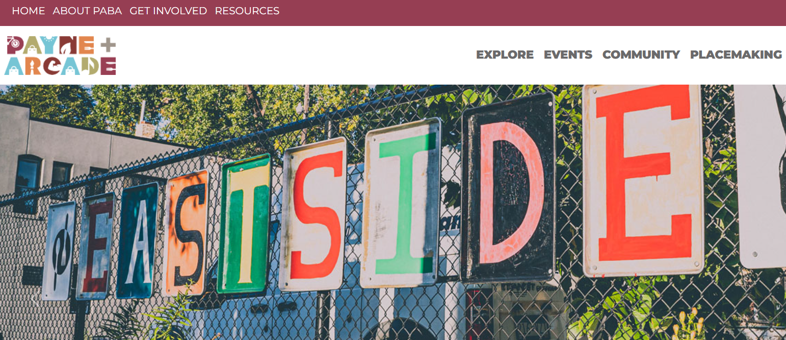 Screenshot of the Payne Arcade Business Association homepage showing sign that says EASTSIDE.