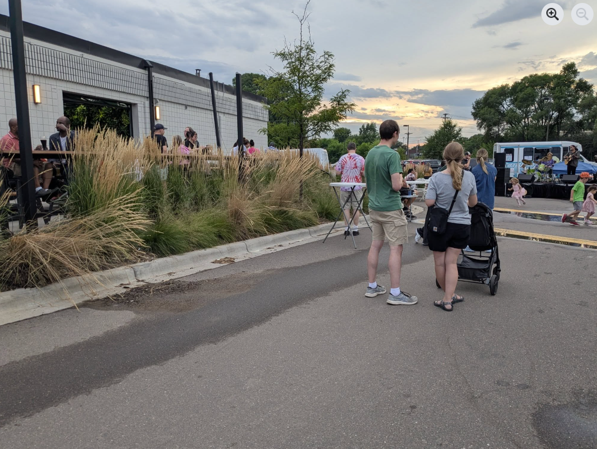 Patrons gather for live music at Wandering Leaf Brewing during a Music at the Plaza event.