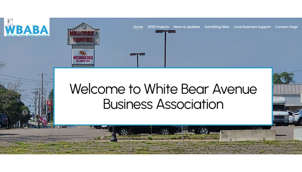 Screenshot of the White Bear Avenue Business Association homepage, with a "Welcome" headline over a photo of the Hillcrest Center shopping area.