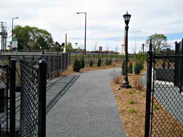 Photo of the gate and path leading to the Lowertown Dog Park