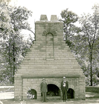 W. LaMont Kaufman (left) and Fred Truax, Parks Commissioner (right) at Joyce Kilmer Fireplace, 1936. Their initials can be seen at the top of the fireplace.