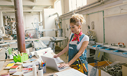 woman in front of table planning