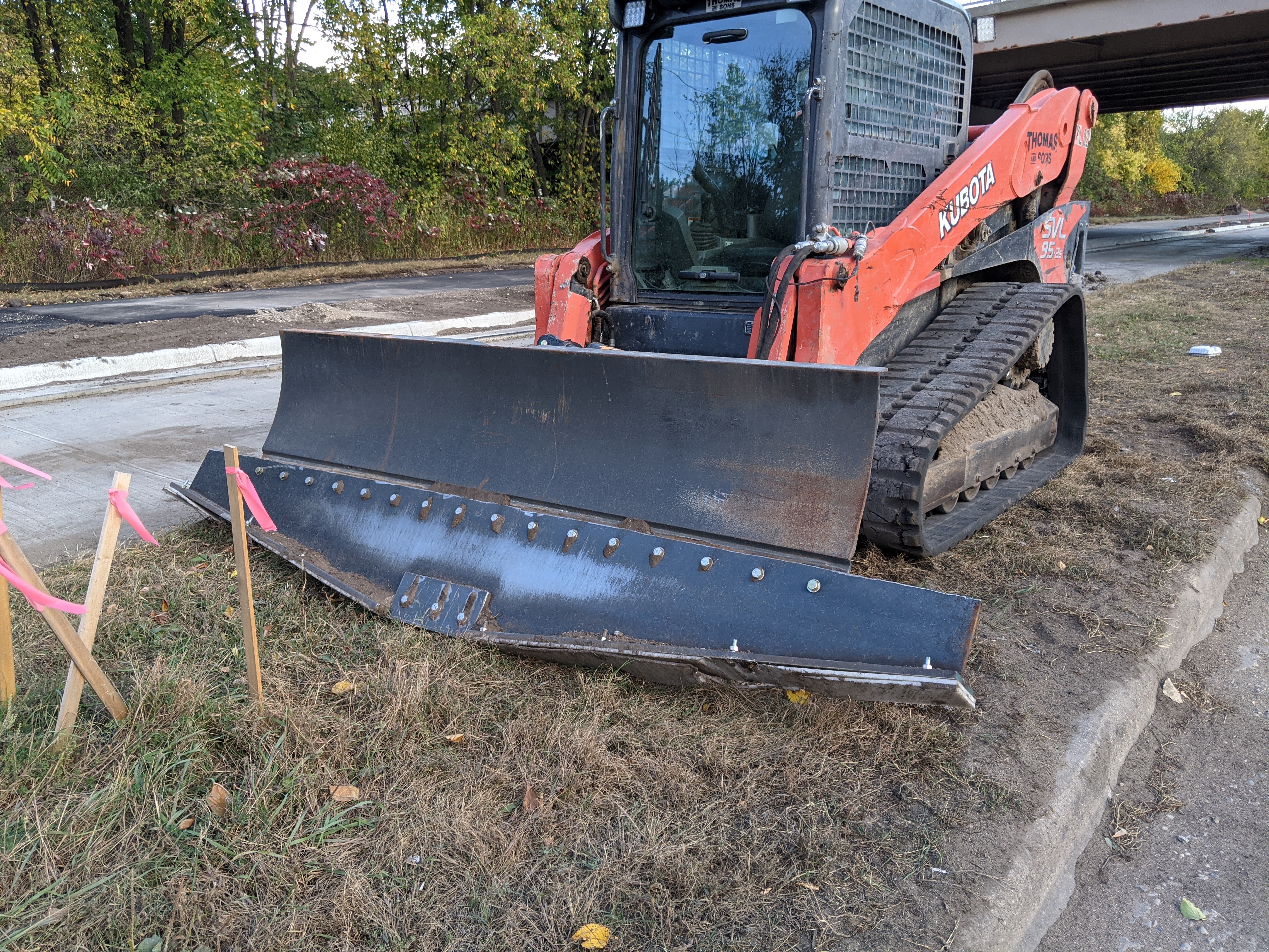 Curved blade used to cut the swale shape into the boulevard. Photo showing Ayd Mill Road construction equipment on 10.2.20.