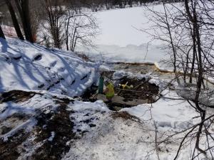 installing sewer end cap at Como Lake