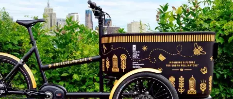 #BeeRealBeeEverywhere Bike - Black cargo bike with yellow bee designs