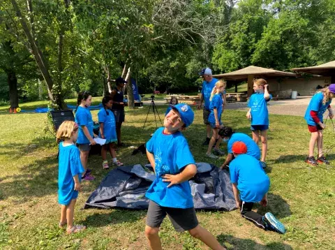Amazing Race 2022 pitching a tent