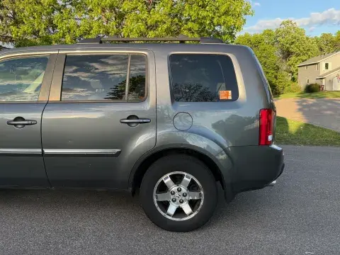Car with residential parking permit in back driver side window