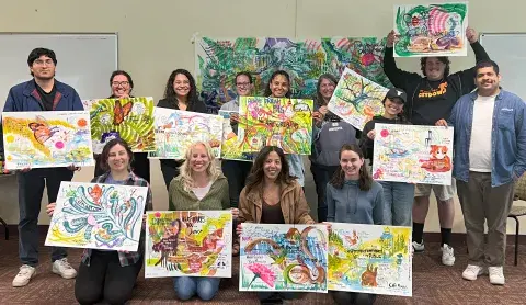 SLC Group Photo holding up their reflection paintings SLC Group Photo holding up their reflection paintings