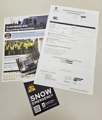 An image of the City of Saint Paul garbage bill and the newsletter and Snow Emergency brochure that was mailed to residents.
