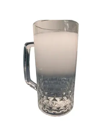 Drinking glass filled with cloudy water