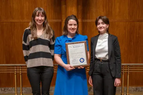 Vikings And Goddesses Pie hold their business awards certificate