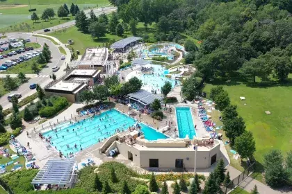 Drone image of a busy Como Regional Park Pool during the summer