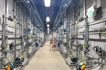 Hallway with pipes, equipment in new McCarrons water treatment plant