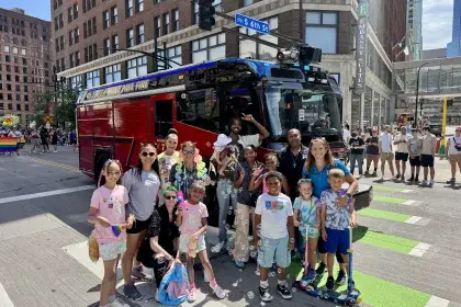 SPRWS staff and family poses at 2025 Minneapolis Pride Parade