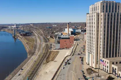 Drone photo of City Hall and the Mississippi River during the day