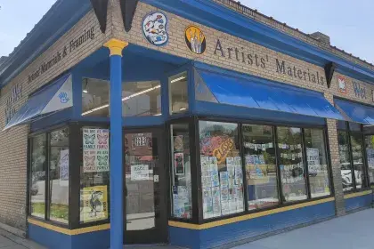 Wet Paint Artists' Materials & Framing storefront on a corner.