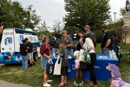 SPRWS Staff answers questions, provides water from Water Wagon at 2026 Community Engagement Event