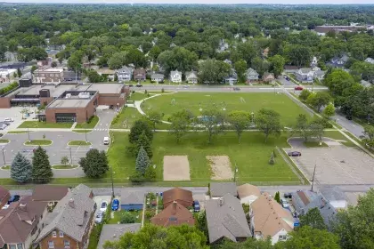 Bird's eye view of Arlington Hills Community Center building and outdoor amenities side view