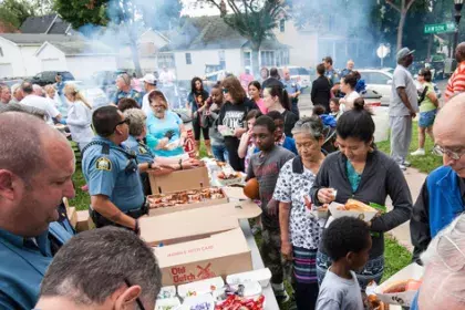 Safe summer nights attendees get food at the event