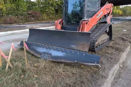 Curved blade used to cut the swale shape into the boulevard. Photo showing Ayd Mill Road construction equipment on 10.2.20. 