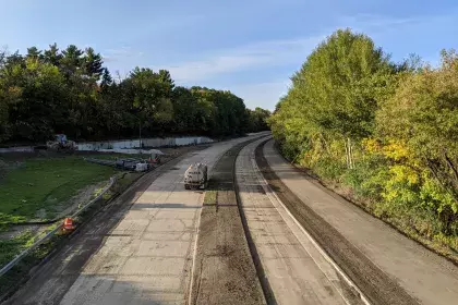 Photo showing the construction of Ayd Mill Road and the trail alongside it on 10.2.20. Photo show view north from the St Clair Avenue overpass.