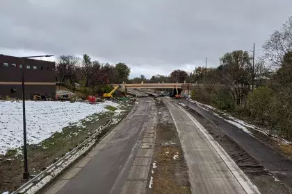 Ayd Mill Road construction photo showing the northbound view from the Grand Avenue overpass as of 10.26.20. Photo shows new trail on east side of Ayd Mill Road and new traffic and street lights.​​​​​​​